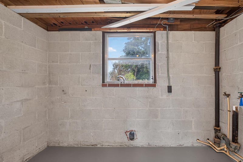 Unfinished interior space with exposed beams at 6238 Randia Dr, Jacksonville, FL 32210