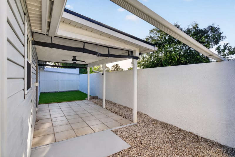 Covered patio and backyard view, photographed by Megapixeler on Birch Run E, Orange Park