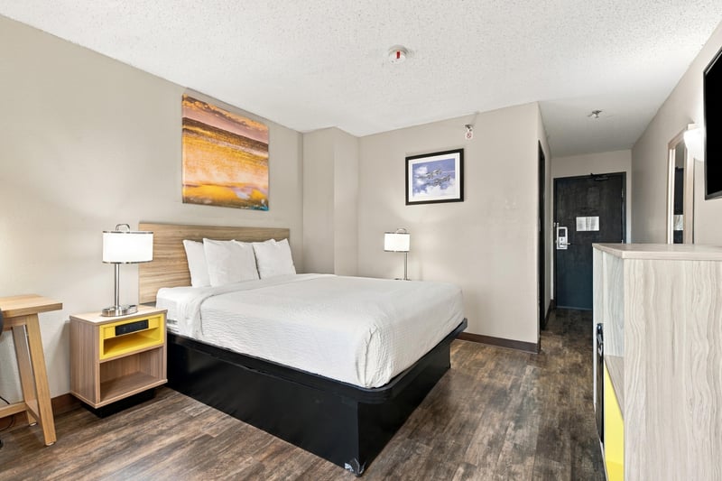 Guest room with bed and artwork, photographed by Megapixeler on Eldridge Loop, Orange Park
