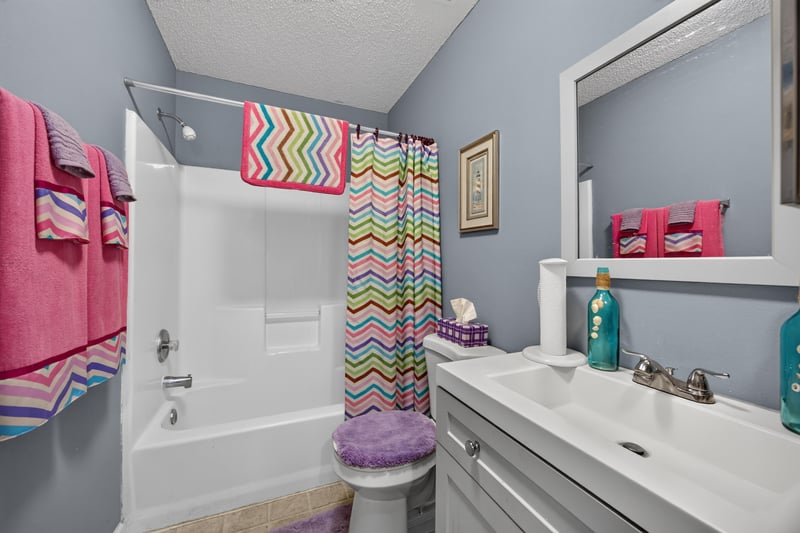 Bathroom with colorful towels and vanity at 5375 Dodge Rd, Jacksonville, FL 32209
