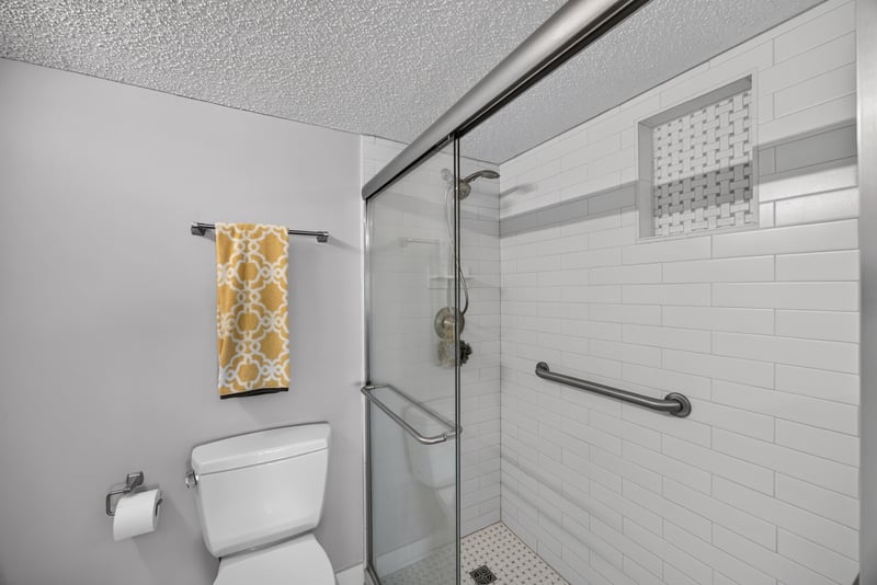 Bathroom with shower and grab bars at 2280 Shepard St