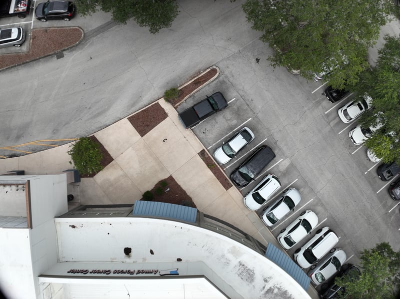 Aerial view of parking lot and landscaped walkway at 9406 Atlantic Blvd, Jacksonville, FL 32225
