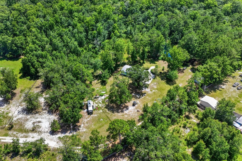 Aerial view of wooded land surrounding the property in Middleburg, FL