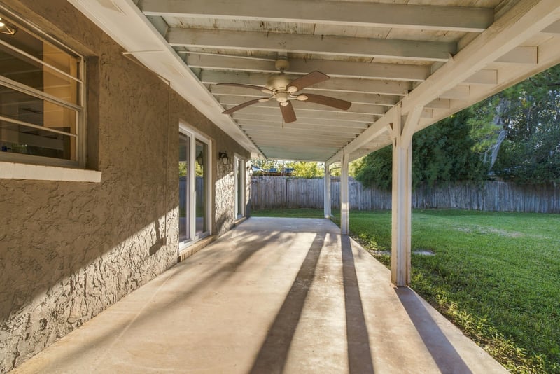 Covered rear porch exterior view, photographed by Megapixeler on Crosby Ln, Orange Park