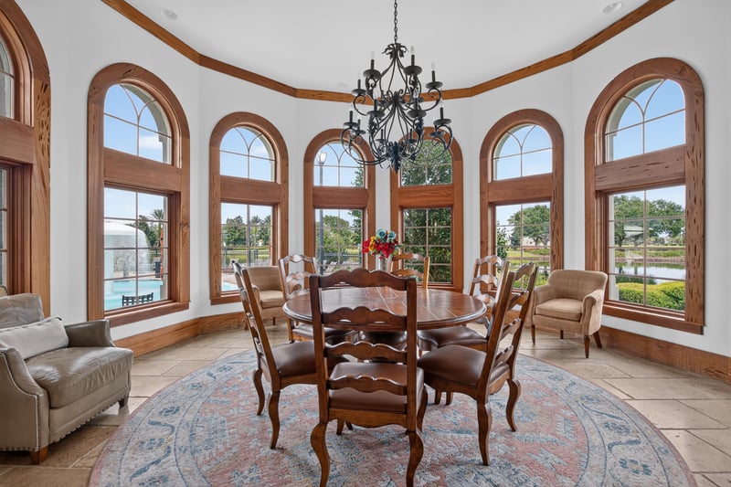 Clubhouse dining area with arched windows in Murabella