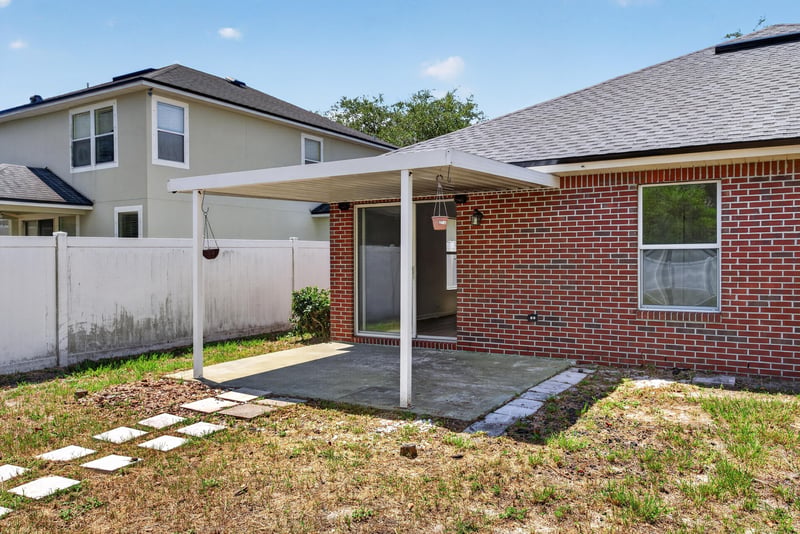 Covered patio and backyard at 224 Pine Arbor Cir, St. Augustine, FL 32084