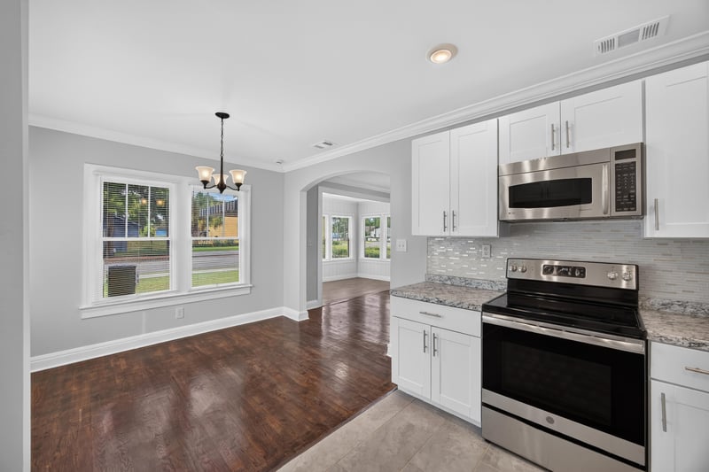 Dining area with windows and stainless microwave at 316 W 41st St, Jacksonville, FL 32206