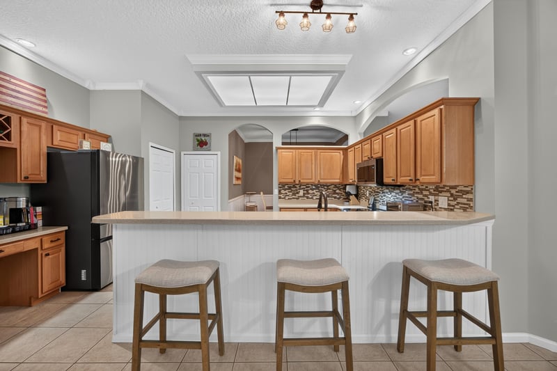Kitchen with breakfast bar and pendant lighting at 2125 Blue Heron Cove Dr, Orange Park, FL 32003
