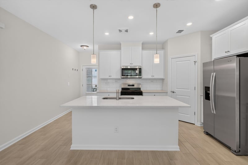 Kitchen island and cabinetry at 39 Mellowood Ln, St. Augustine, FL 32092
