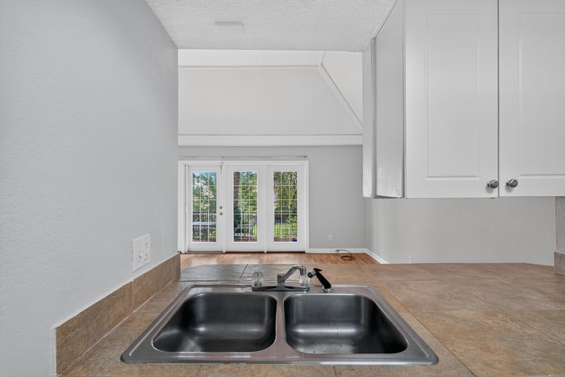 Kitchen counter with stainless double sink at 3866 Campenero Ct unit 6, Jacksonville, FL 32217
