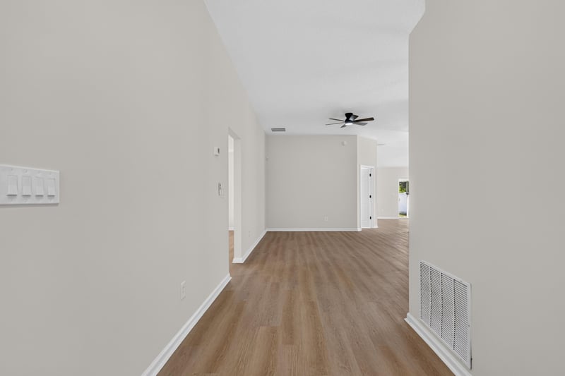 Entry hallway with wood-look flooring at 224 Pine Arbor Cir, St. Augustine, FL 32084