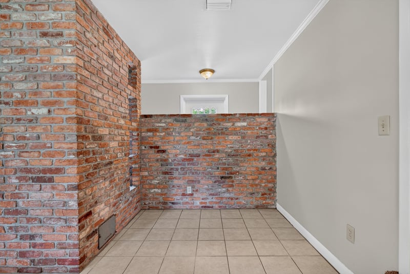 Brick wall pass-through to kitchen at 2618 Arlex Dr E, Jacksonville, FL
