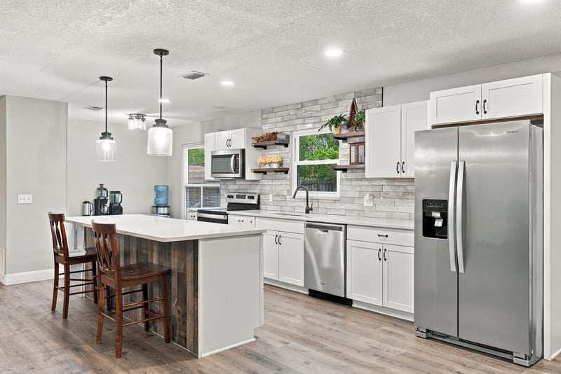 Kitchen with stainless appliances and pendant lights at 357 Dillon Dr, Orange Park, FL