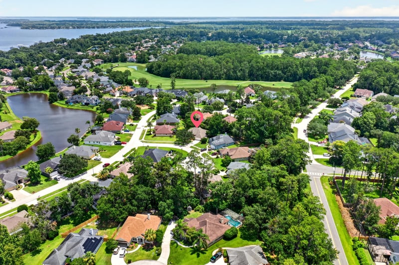Aerial view of community streets and homes in Fleming Island, FL