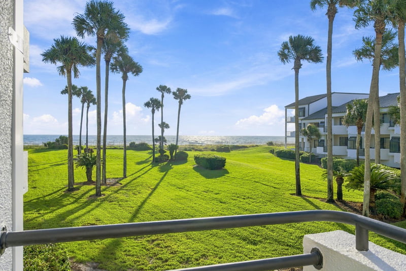 Lawn and palm trees panorama at 805 Spinnakers Reach Dr, Ponte Vedra Beach, FL 32082