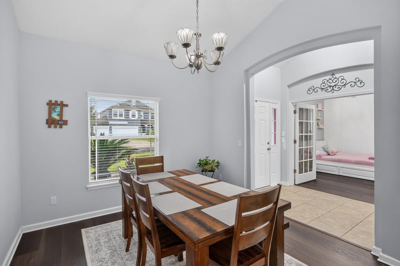 Dining room with arched doorway to bedroom at 538 Porta Rosa Circle, St. Augustine, FL 32092