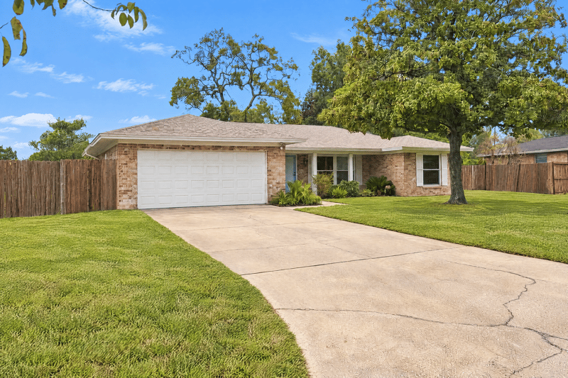 Front exterior close on garage door and walkway at 357 Dillon Dr, Orange Park, FL