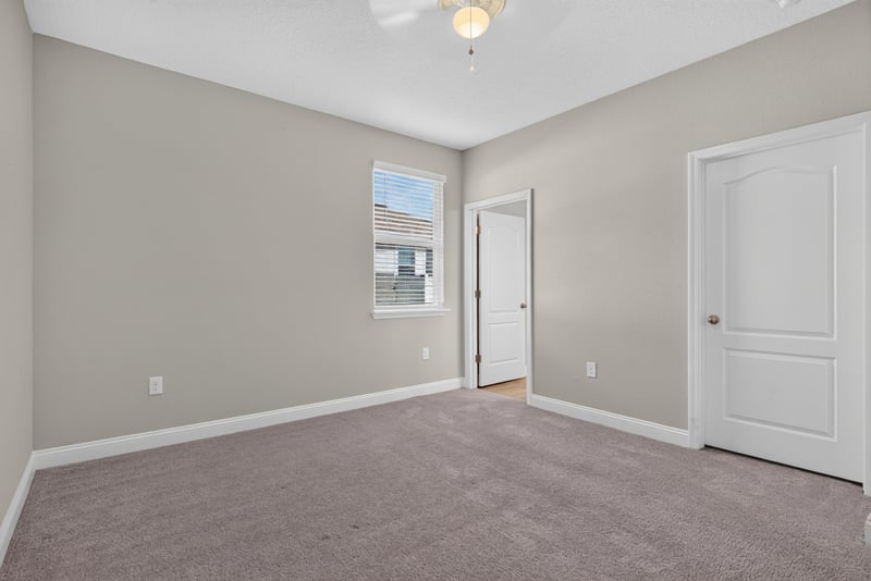 Bedroom with carpet and single window at 2580 Cold Stream Ln, Green Cove Springs, FL 32043