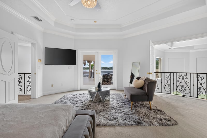 Bedroom sitting area with rug and chair at 344 Broward Rd, Jacksonville, FL