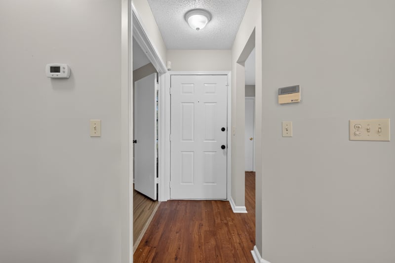 Hallway leading from the entry at 8010 International Village Dr, Jacksonville, FL 32277