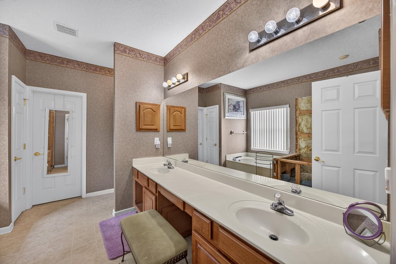 Bathroom with double vanity at 2875 Pebblewood Ln, Orange Park, FL 32065