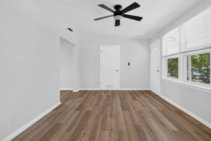 Living room corner with ceiling fan at 855 Cornwallis Dr, Jacksonville, FL