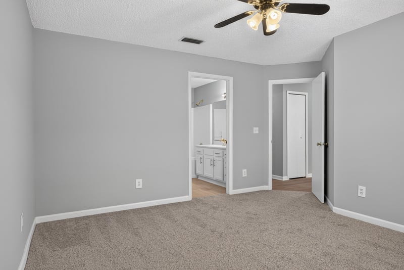 Hallway with closet doors at 1108 Hidden Cove Cir S, Atlantic Beach, FL 32233