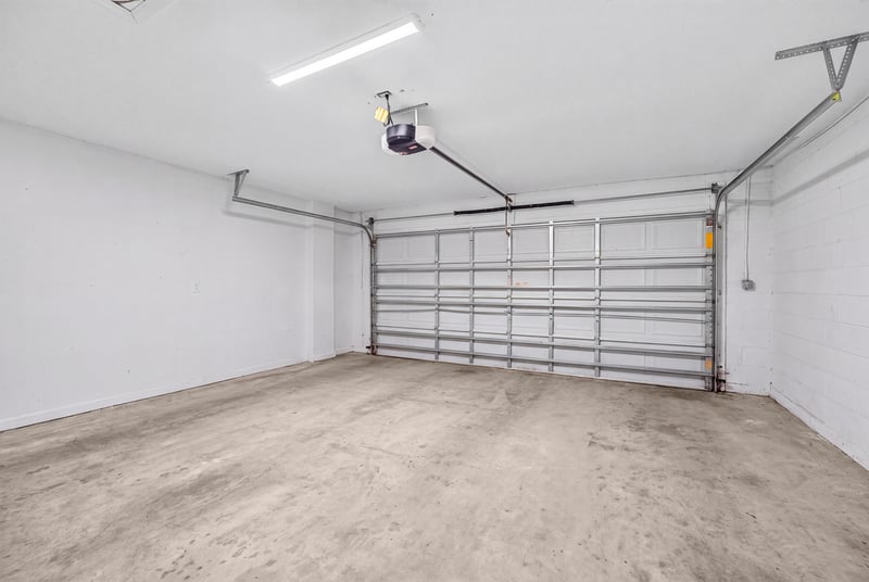 Empty two-car garage at 3428 Glenn Hollow Ct, Jacksonville, FL 32226