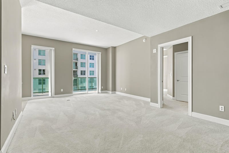 Empty living room with natural light, photographed by Megapixeler on Riverplace Blvd, Jacksonville