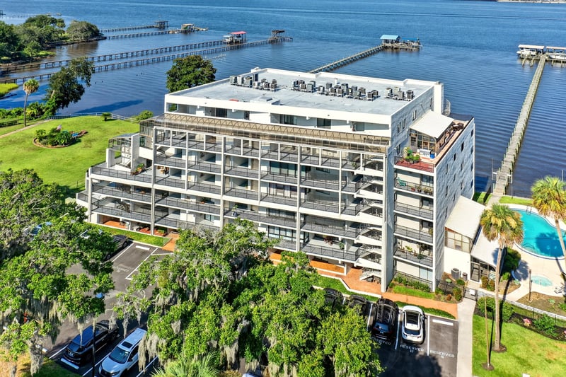 Aerial view of waterfront condo building with pool at 2280 Shepard St, Jacksonville