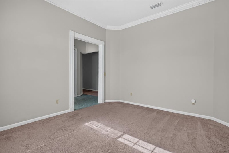 Empty room with doorway to hallway and carpet at 400 Ashcroft Landing Dr, Jacksonville, FL 32225