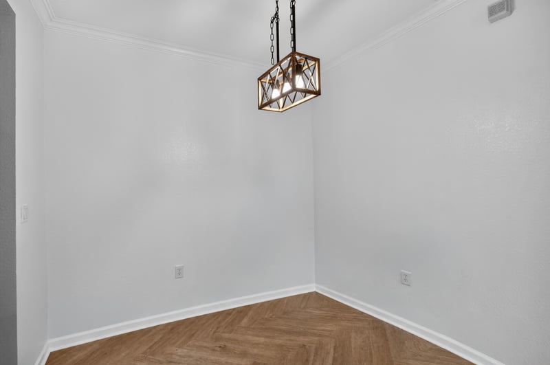 Dining area with pendant light fixture at 10075 Gate Pkwy unit 1905, Jacksonville, FL 32246