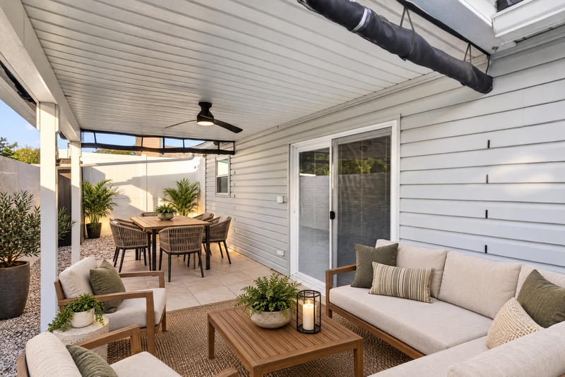 Covered patio with seating area, photographed by Megapixeler on Birch Run E, Orange Park