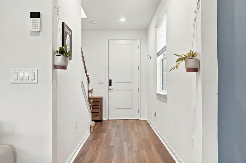 Entry hallway with wood flooring, photographed by Megapixeler on Torres Trace, St. Augustine