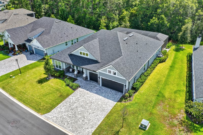 Aerial front view of the home from the street at 785 Back Creek Dr, St. Augustine, FL 32092