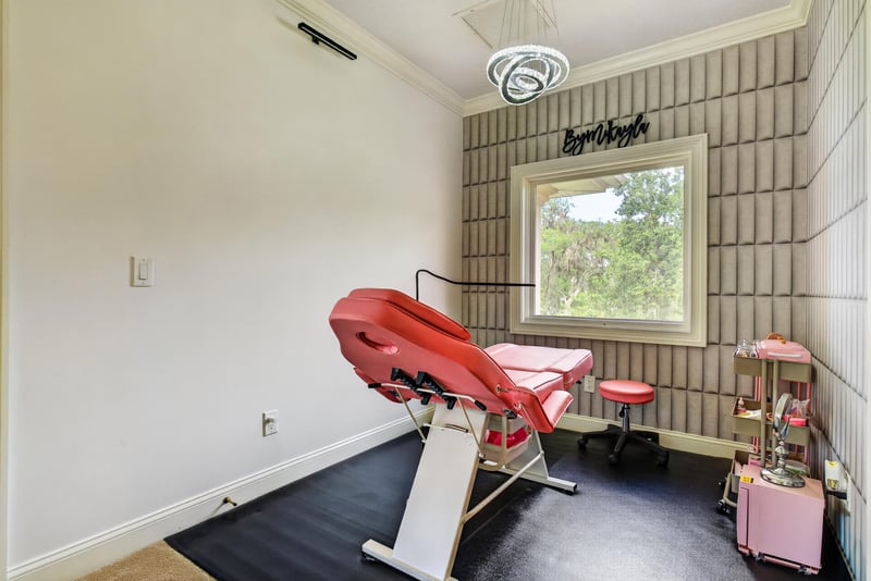 Room set up with a massage table at 344 Broward Rd, Jacksonville, FL
