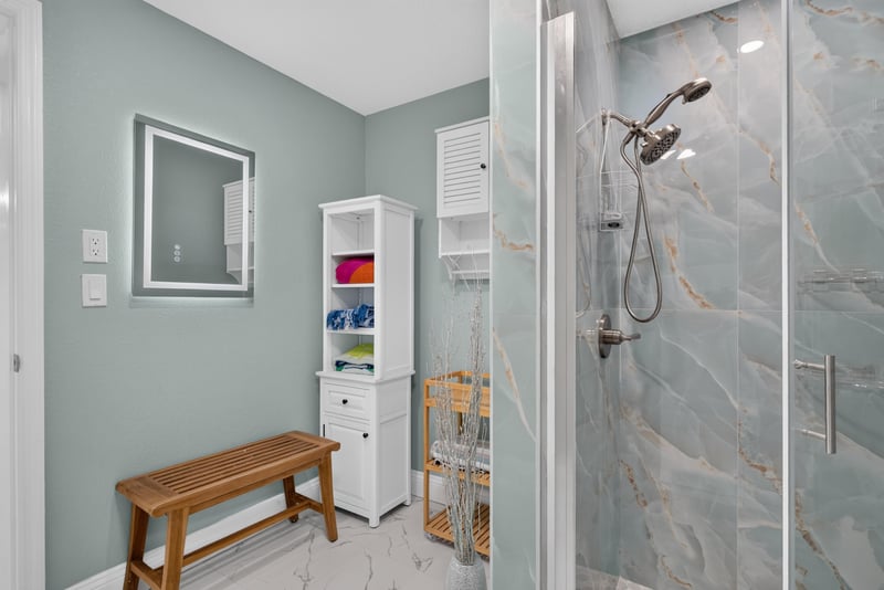 Bathroom with walk-in shower at 1525 8th St N, Jacksonville Beach, FL