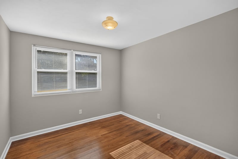 Room with window and hardwood floors at 6338 Mercer Cir W, Jacksonville, FL