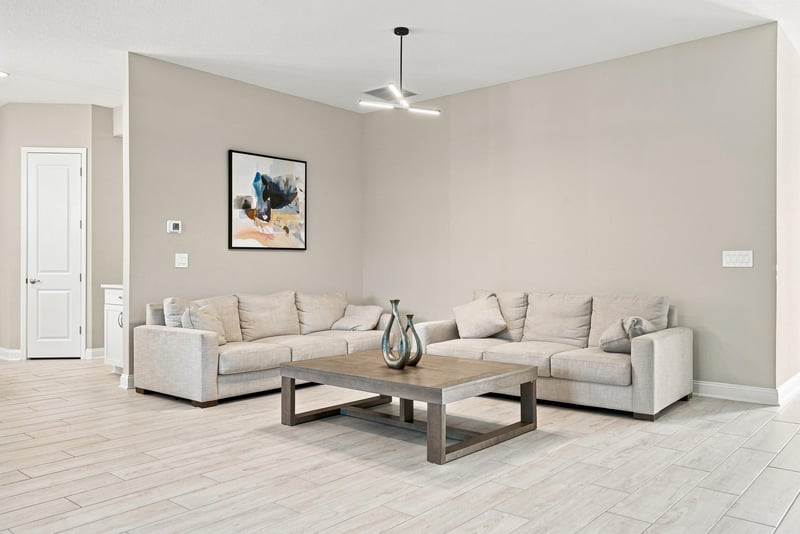 Living room with sectional sofa and coffee table at 27 Holly Rdg Wy, St. Augustine, FL