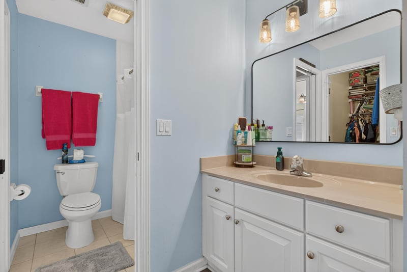 Bathroom vanity and mirror at 2304 Spring Hill Ct, Orange Park, FL