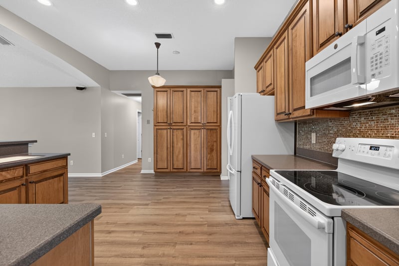 Kitchen counter and cabinetry at 1955 GUARDED Way, Fleming Island, FL 32003