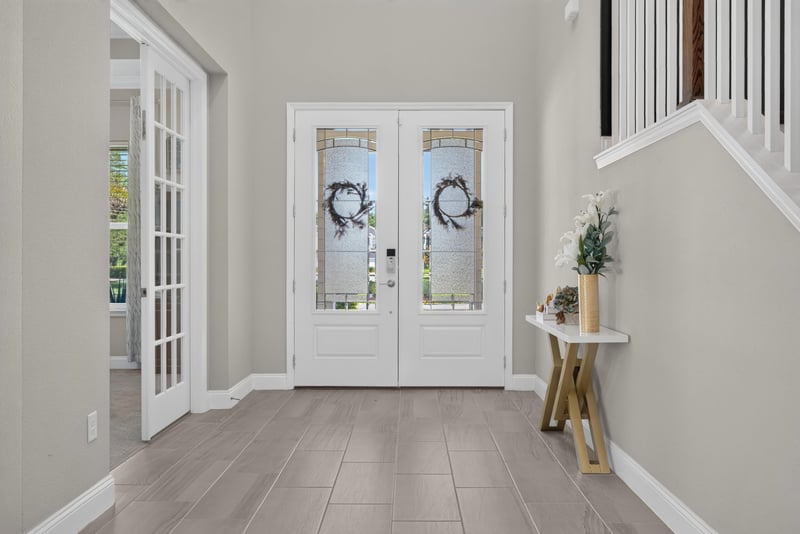 Foyer with double interior doors and tile floor at 22 Azura Point