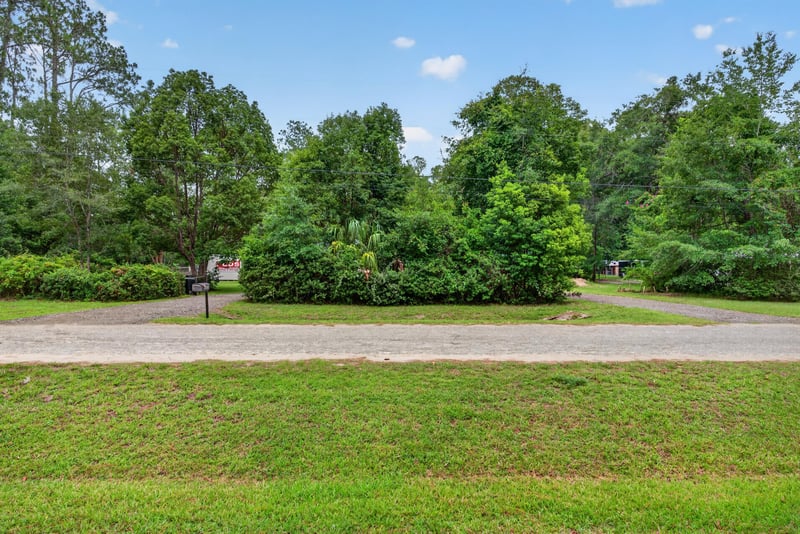 Open lawn area near the driveway at 3249 Maryland Ave, Green Cove Springs, FL