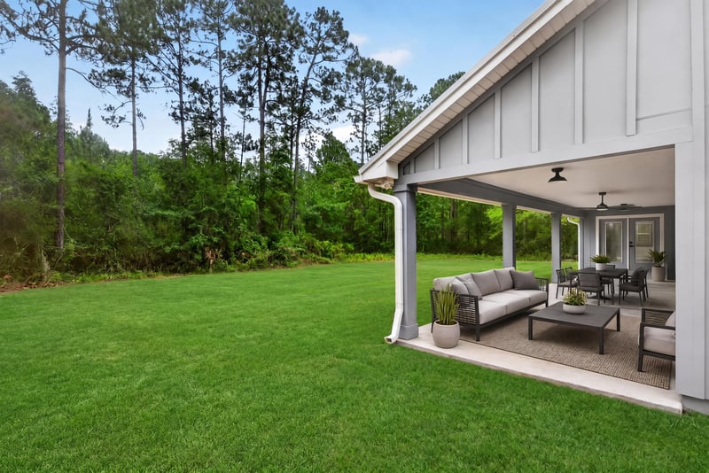 Covered back porch sitting area at 4800 Acacia St, Middleburg, FL 32068