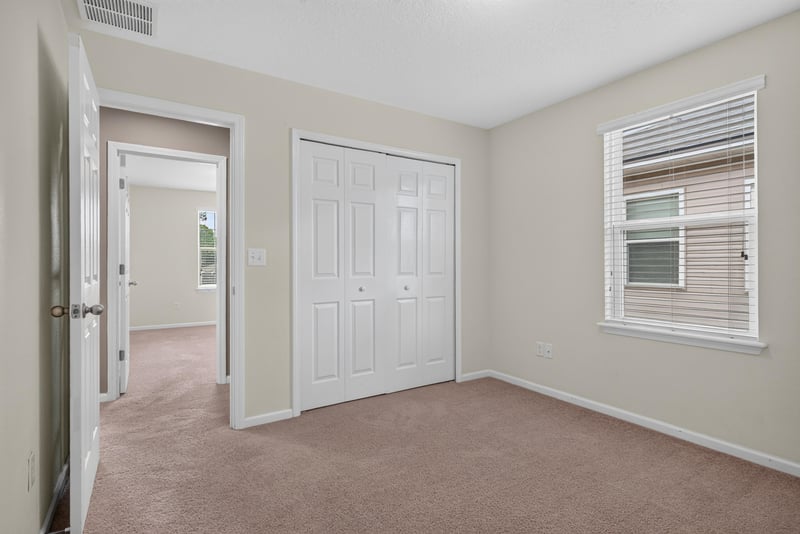 Bedroom with closet and window at 263 Gilmore Ln, Orange Park, FL 32065