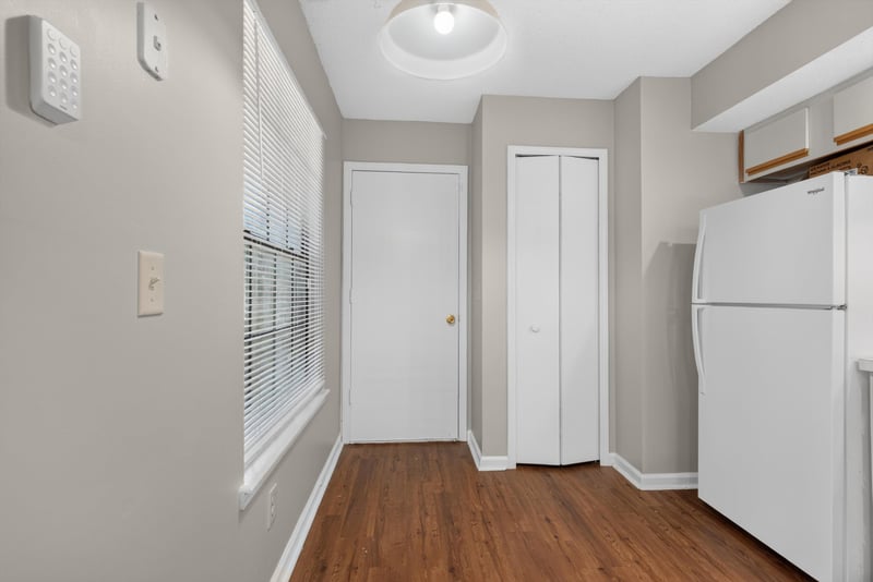 Hallway with closet doors at 8010 International Village Dr, Jacksonville, FL 32277