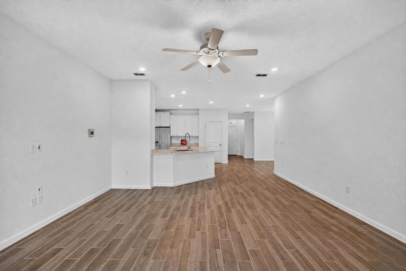 Hallway with ceiling fan and doorways at 9905 Ansley Lake Dr, Jacksonville, FL
