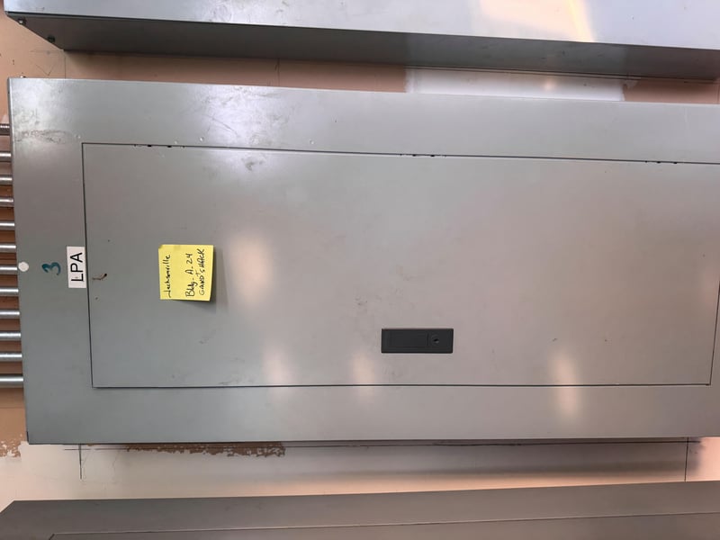 Panel cover labeled LPA at 11700 New Kings Rd, Jacksonville, FL 32219