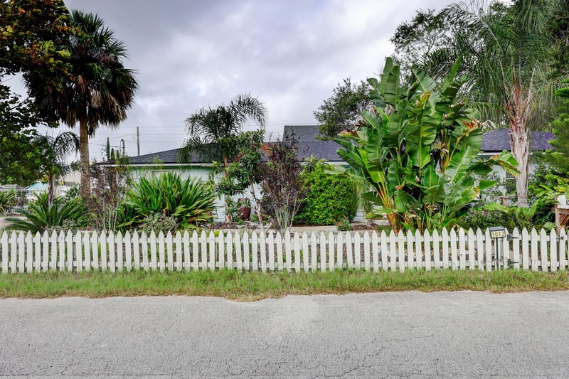 Front (Overgrown Vegetation Blocks the House) at 1012 8th St S, Jacksonville Beach, FL 32250