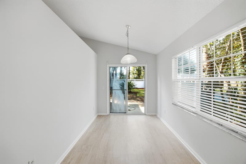 Dining nook with windows at 678 5th Ave N, Jacksonville Beach, FL 32250